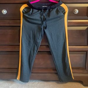 Zara pin stripe trousers with yellow stripe on side.